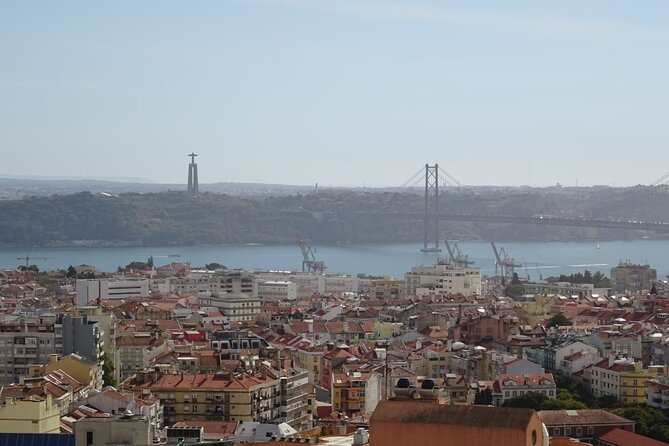 1-hour private eco tuk-tuk tour for up to 6 people through Lisbon - Portas do Sol and the first big view
