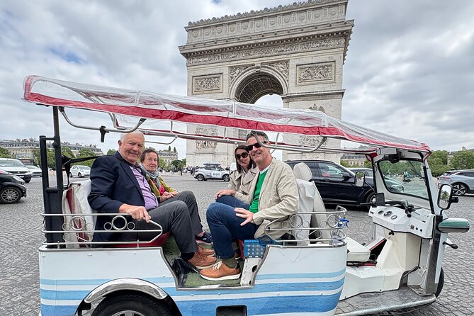 4 Hour Grand Paris Tour by Electric Tuk Tuk See Almost Everything - The Arc de Triomphe and the grand western avenue