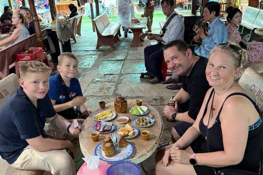 Authentic Mekong Delta: Tuk Tuk, Rowing Boat, Biking Tour - Cruising the Tien River toward Qui Islet
