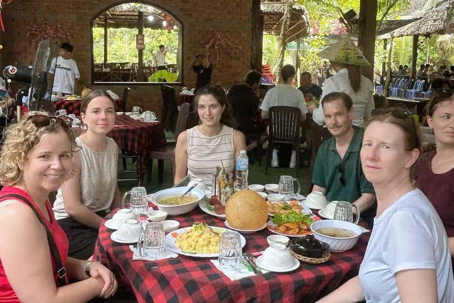 Authentic Mekong Delta: Tuk Tuk, Rowing Boat, Biking Tour - A regional lunch and tropical fruit garden