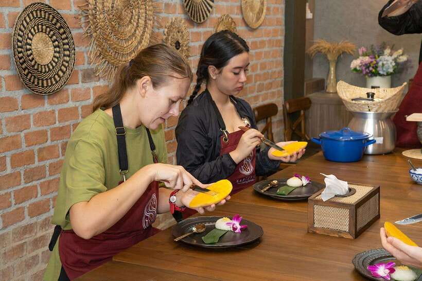 Bangkok: Cooking Class with Market Visit & Tuk Tuk Ride - Cooking four Thai dishes in a small class
