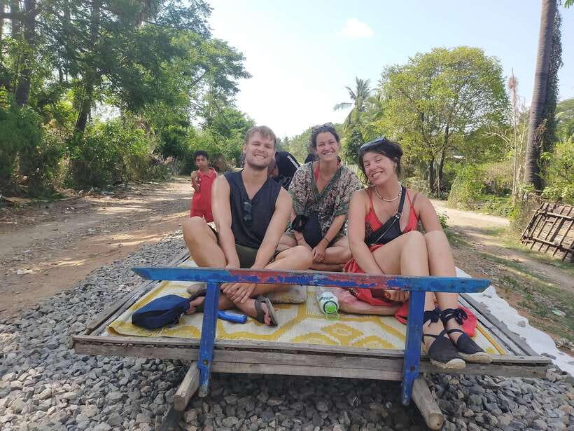 Battambang: Tuk-Tuk, Bamboo Train, Killing/Bat Caves, Sunset - Rice fields, fruit farms, and the wobbly suspension bridge