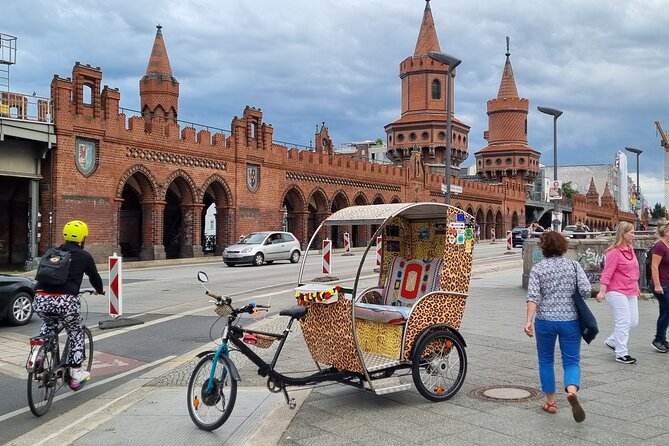 Berlin Rickshaw Tours Historical & Photo City Tour 120min - Sightseeing - A GDR watchtower and Checkpoint Charlie recall the divided city
