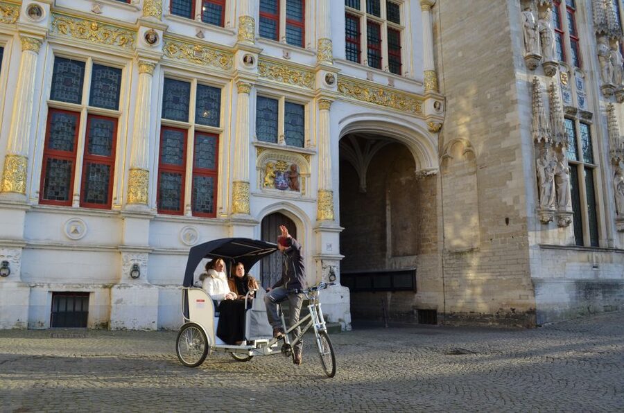 Bruges: Guided Rickshaw Tour - Price and Practical Value