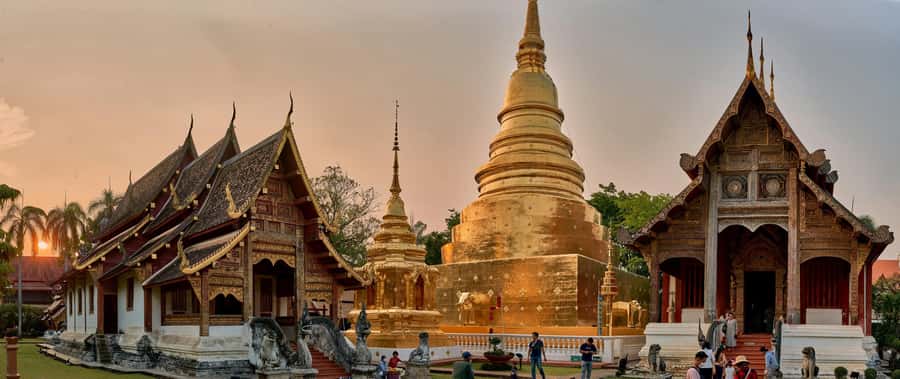 Chiang Mai Light: Tuk Tuk Night Tour with Temples & Markets - Tha Phae Gate after sunset