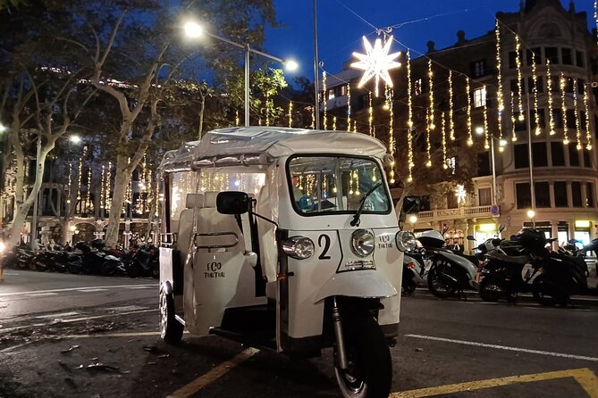 Christmas Lights Tour of Barcelona in Private Eco Tuk Tuk - Rambla de Cataluña, Casa Calvet, and the Arc de Triomphe