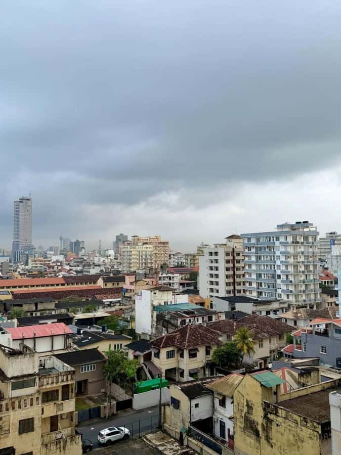 Colombo Tuk Tuk Tour with Entry Fees & Food Included - Churches, harbor views, and the changing waterfront