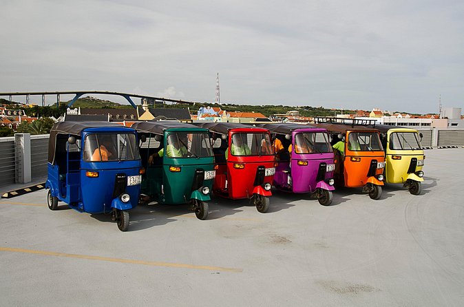Curacao TukTuk City Tour - Queen Wilhelmina Park and the DUSHI sign