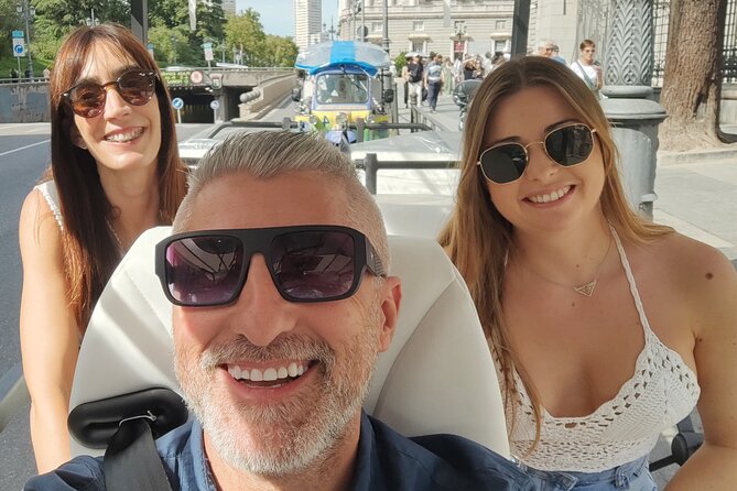 Discover Madrid in a Fun & Eco-Friendly Tuk-Tuk – Private Tour - Salamanca, Plaza Colón, and the city’s polished side