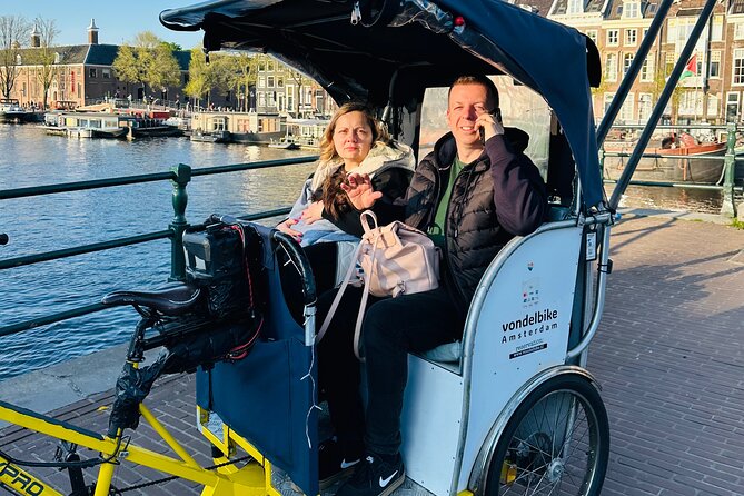 Explore Amsterdam in 75 Minutes – Pedicab Rickshaw City tour - Dam Square and the city’s central stage