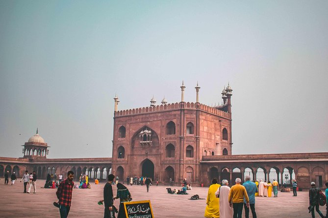 Guided 3‑hour rickshaw ride through Old Delhi with transfers - Starting at Chawri Bazaar among metal and paper shops