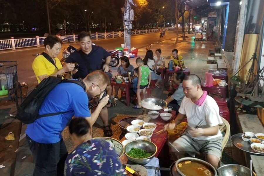 Hue: Night Street Food Tour by Cyclo with a Local Guide - Crossing Truong Tien Bridge to finish the night