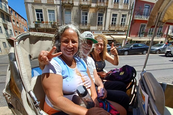 Lisbon Adventure: 2 Hours Tuk-Tuk Tours and 2 H Sunset Sailing - Lisbon Cathedral and the first hilltop views