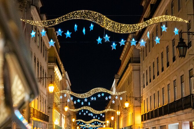 Lisbon Christmas Lights Tuk-Tuk Tour with Local Guide - Chiado adds shopping displays and playful decoration