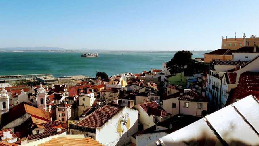 Lisbon Essentials 5H Tuk Tuk seightseeing Tour Free Pickup - Ginjinha, Lisbon in a small glass