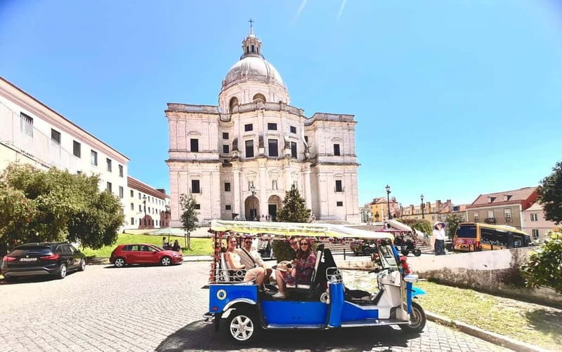 Lisbon: Private Tuk Tuk Tour with Polaroid Photos - The waterfront return through central Lisbon