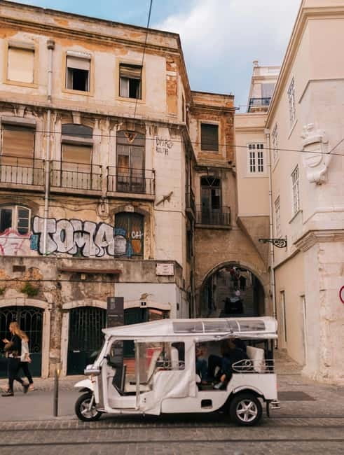 Lisbon: Private Tuk Tuk Tour with Professional Guide - Commerce Square and the riverside pause