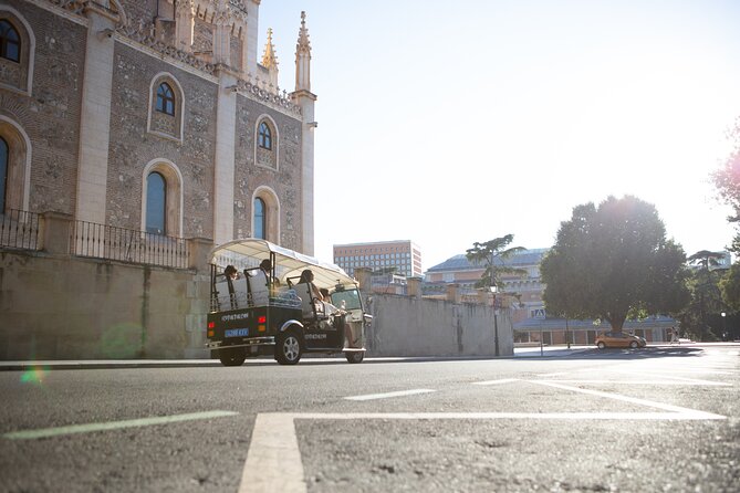 Madrid Expert Plus Tour with Local Guide in Eco Tuk Tuk Private - Columbus, the National Library, Cibeles, and the Bank of Spain