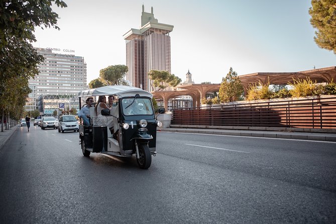Madrid Expert Tour with Local Guide in Eco Tuk Tuk Private - Neptune, the Prado, and Los Jerónimos
