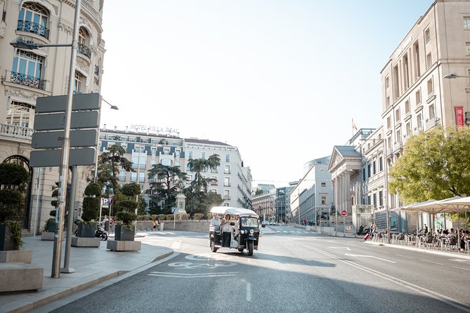 Madrid Expert Tour with Local Guide in Eco Tuk Tuk Private - Columbus, the National Library, and Cibeles