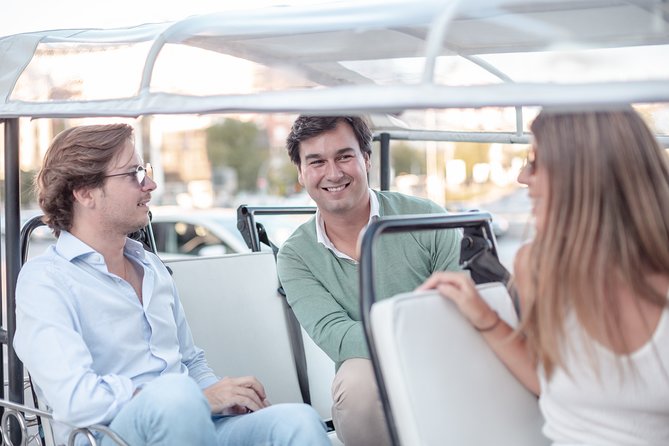 Madrid Express Tour with Local Guide in Eco Tuk Tuk Private - Plaza Mayor and the San Miguel Food Market