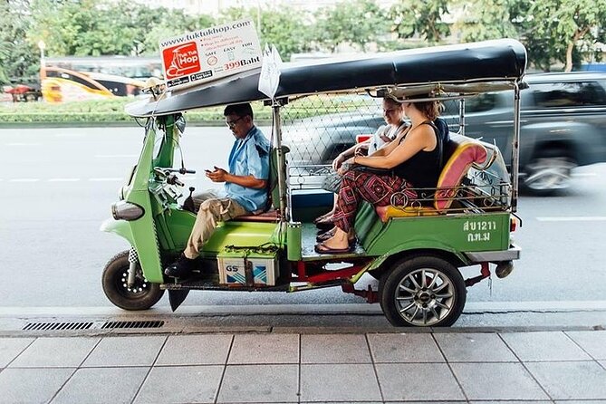 Michelin Guide Street Eats by Tuk Tuk: Bangkok Night Tour - Pa Tong Go doughnuts on a narrow Chinatown street