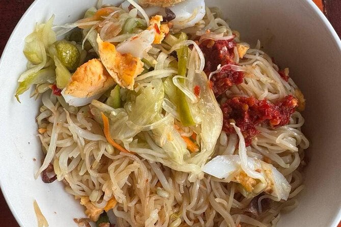 Morning Tuk Tuk Food Tour: Taste Iconic Dishes of Battambang - Nom banh chok beside a family home