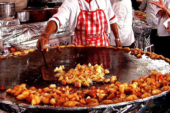 Old Delhi Street Food Tour with TUK-TUK Adventures - Walking, cycle rickshaws, and the pace of the lanes