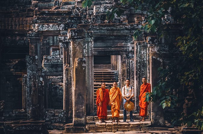 Personalised Angkor Wat Sunrise Tour by TukTuk - Bayon’s stone faces