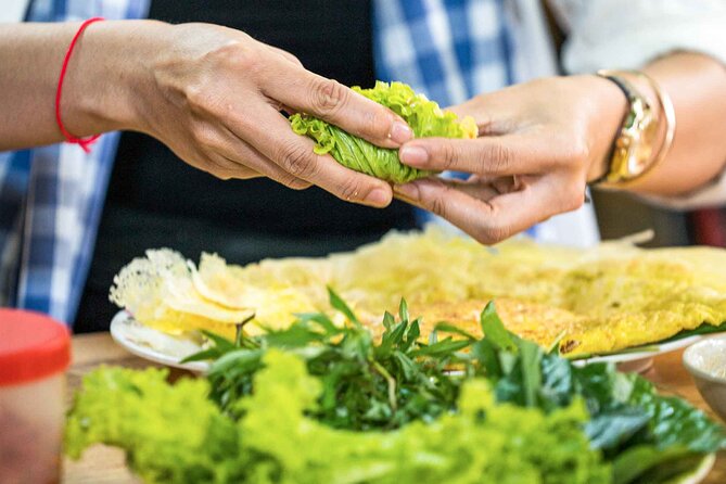 Phnom Penh Morning Market & Food Tour by Tuktuk - Includes All Food & Drinks! - Yellow turmeric crepes with plenty of texture