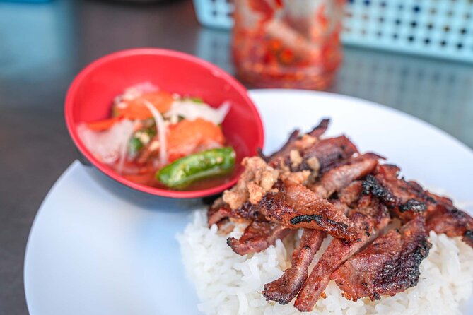 Phnom Penh Morning Market & Food Tour by Tuktuk - Includes All Food & Drinks! - A wet market with Sister Mao