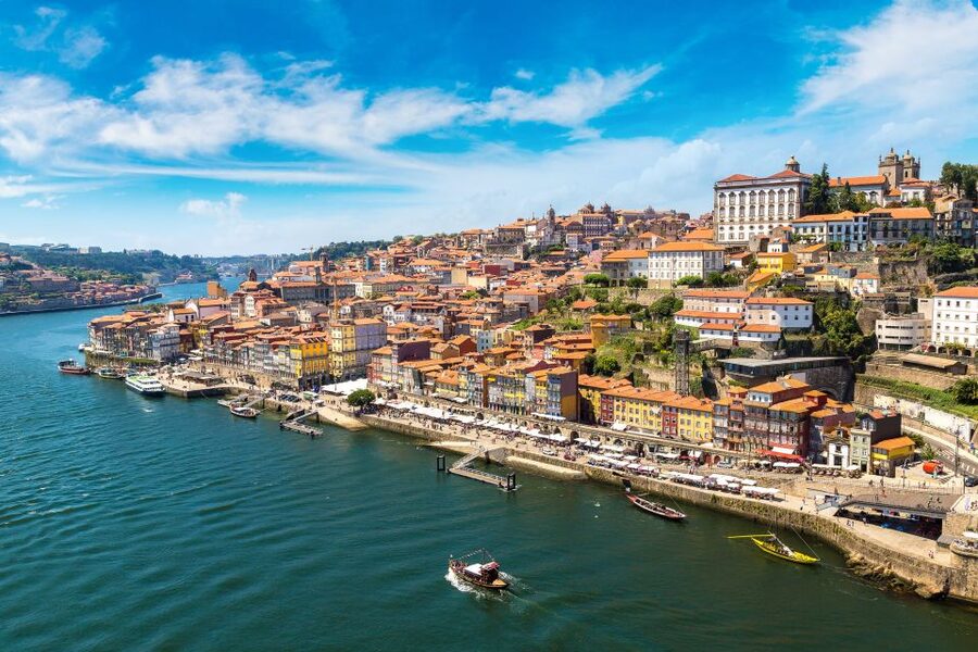 Porto: Tuk-Tuk Tour, Douro River Cruise, and Wine Tasting - Taking the rabelo boat from Ribeira