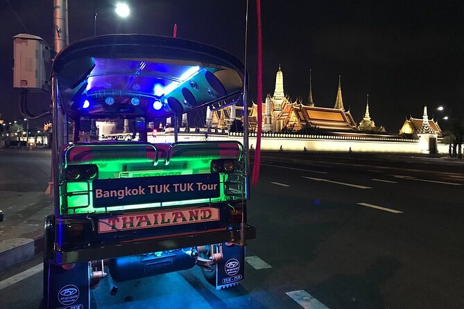 Private Bangkok Night City Tour by Tuk-Tuk with Thai Food - Wat Arun under evening lights