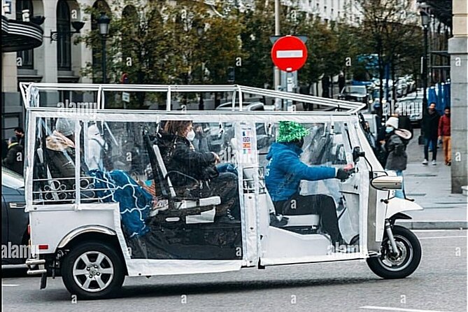 Private Panoramic Tuk Tuk Tour in Madrid - Comfort, rain, and the small cabin