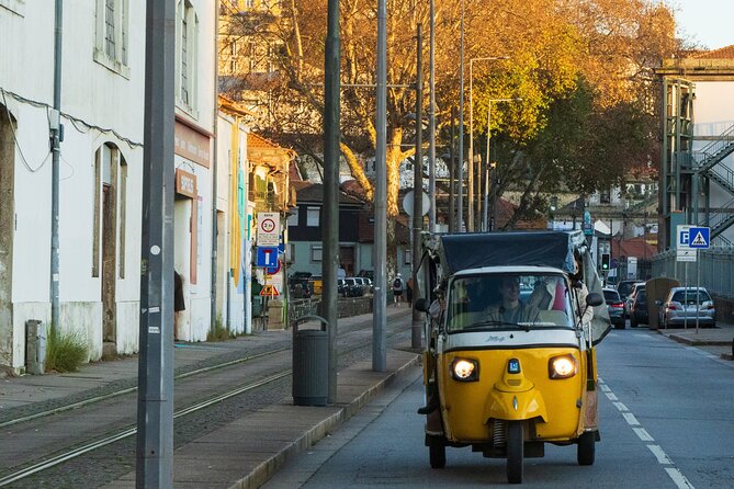 Private Port: Tuk Tuk and boat with local guides - Boarding at Cais do Ouro with local guides
