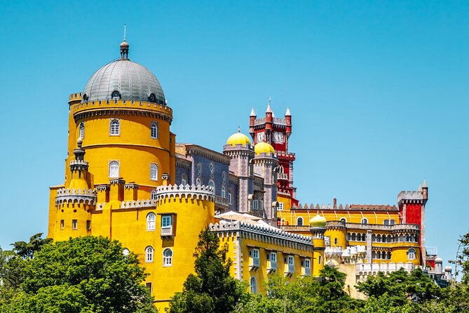 Private Tour Sintra, Palaces and Mountain Tuk Tuk(2 to 6 people) - The Moorish Castle walls above the road