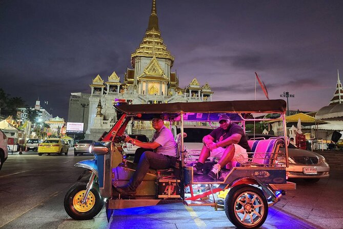 Private Tuk Tuk Night Adventure with Dinner - A lit-up Grand Palace photo stop
