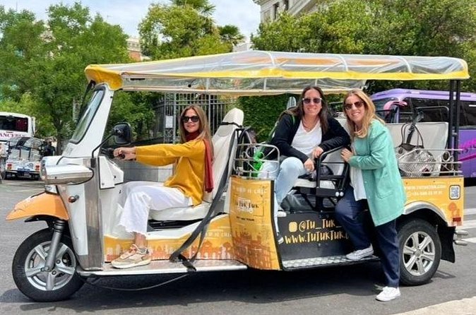Privately Guided Panoramic Tour in Yellow Tuk Tuk from Madrid - Retiro and the eastern center