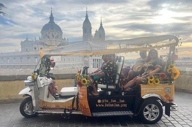 Privately Guided Panoramic Tour in Yellow Tuk Tuk from Madrid - Calle de Alcalá, the Metropolis Building, and Santa Ana