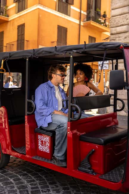 Rome: City Highlights E-Tuk Tuk Tour - The Colosseum and Imperial Fora from the road