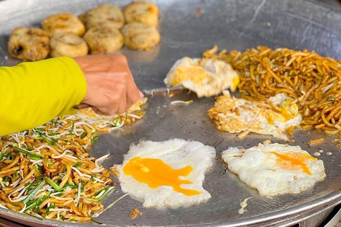 Siem Reap: Local Street Food Experience by Tuk-Tuk - The night market is the adventurous part