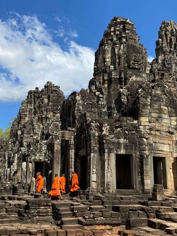 Siem Reap: Personalized Angkor Wat Sunrise/Set by TukTuk/Car - Bayon’s stone faces and the final ride home