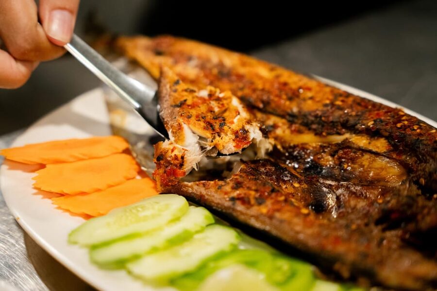 Siem Reap's Ultimate Street Food Tour by Tuk Tuk - Two classic dishes at a family-run roadside stall