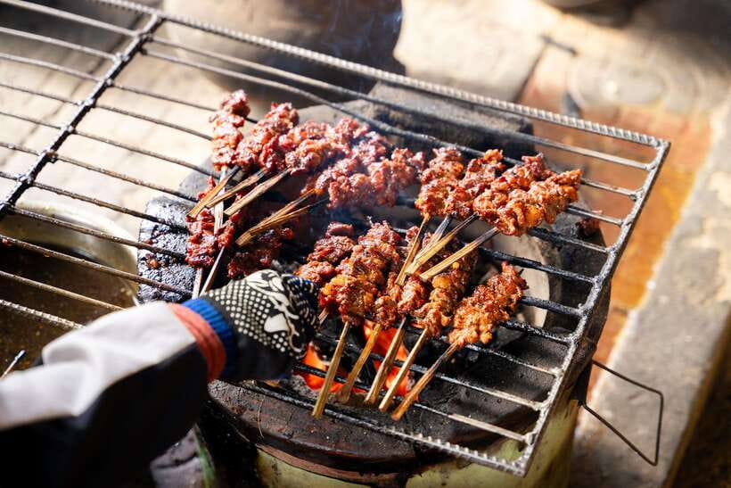 Siem Reap's Ultimate Street Food Tour by Tuk Tuk - Starting at Wat Damnak with a snack and beer