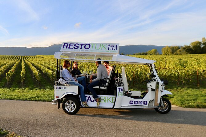 The Private Tuk Tuk Tour with one of The Best Fondues in Geneva! - Molard Tower and Geneva’s old commercial heart
