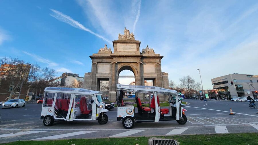 Tour Madrid: Secrets in a Electric Tuk Tuk - Retiro Park offers a change of pace