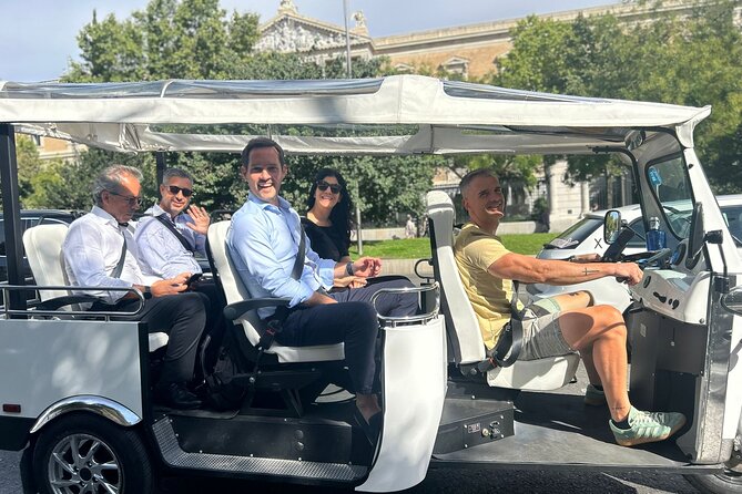 Tour of Castizo Madrid with a private guide in a yellow Tuk-Tuk - Royal Palace and Almudena Cathedral