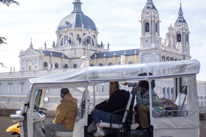Tour of Castizo Madrid with a private guide in a yellow Tuk-Tuk - Puerta de Alcalá and the Prado