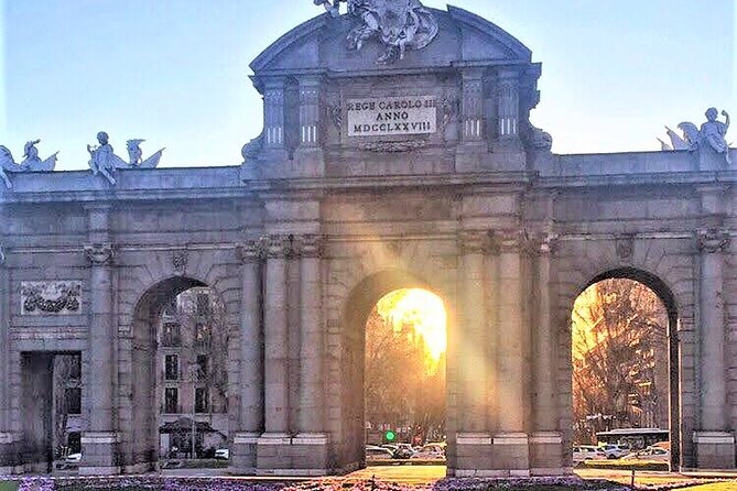 Tour of Historic and Modern Madrid with a guide in a yellow tuk tuk - Food, plazas, and the traditional neighborhoods