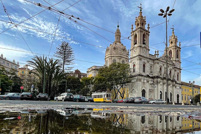 Tuk tuk experience through the historic neighborhood of Alfama - A Mannerist church on the way